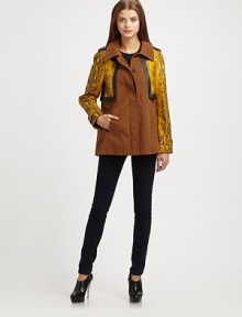 A cropped shrug of vibrant snake-print leather adds just the right edge to this A-line cotton topper.Point collarEpaulettesConcealed button frontSlash pocketsAbout 30 from shoulder to hemShrug: leatherBody: cottonSilk liningDry clean by a leather specialistImported of Italian fabricModel shown is 5'10 (177cm) wearing US size Small.