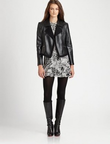 Softer than imaginable, a leather moto jacket with an enviable fit, thanks to stretch-fabric insets.Notched collarZipper detail on sleevesAsymmetrical front zipperZipper pocketsFully linedAbout 21 from shoulder to hemBody: lambskin leatherInsets: wool/nylon/elastaneDry clean by leather specialistImported Model shown is 5'10 (177cm) wearing US size Small. Softer than imaginable, a leather moto jacket with an enviable fit, thanks to stretch-fabric insets.Notched collarZipper detail on sleevesAsymmetrical front zipperZipper pocketsFully linedAbout 21 from shoulder to hemBody: lambskin leatherInsets: wool/nylon/elastaneDry clean by leather specialistImported Model shown is 5'10 (177cm) wearing US size Small.