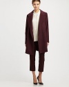 Rich felted wool, slightly oversized in a classic double-breasted silhouette.Notched-collarLong sleevesButton frontWelt pocketsAbout 36 from shoulder to hem50% acrylic/25% polyester/20% wool/5% polyamideDry cleanImportedModel shown is 5'9½ (176cm) wearing US size 4.