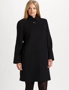 Simply elegant and made from fine Italian fabrication, a stand-collar coat with classic princess seams, convenient pockets and a universally flattering A-line silhouette.Button closure at stand collarPrincess seamsSlash pocketsFully linedAbout 36 from shoulder to hemWool/angora/nylonDry cleanImported of Italian Simply elegant and made from fine Italian fabrication, a stand-collar coat with classic princess seams, convenient pockets and a universally flattering A-line silhouette.Button closure at stand collarPrincess seamsSlash pocketsFully linedAbout 36 from shoulder to hemWool/angora/nylonDry cleanImported of Italian