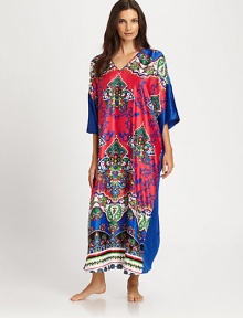 An artistic print defines this colorful design, rendered in signature lightweight fabric. V-neckWide dolman sleevesPullover styleAbout 52 from shoulder to hemPolyesterMachine washImported