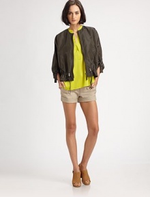 A cropped update on the classic anorak style, cinched at the sleeves and waist for a slouchy, feminine fit.RoundneckZipper frontRoll-tab sleevesSlash pocketsDrawstring waistAbout 22 from shoulder to hem99% nylon/1% polyurethaneDry cleanImportedModel shown is 5'10 (177cm) wearing US size Small. A cropped update on the classic anorak style, cinched at the sleeves and waist for a slouchy, feminine fit.RoundneckZipper frontRoll-tab sleevesSlash pocketsDrawstring waistAbout 22 from shoulder to hem99% nylon/1% polyurethaneDry cleanImportedModel shown is 5'10 (177cm) wearing US size Small.