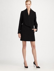 This refined, sculptural style in rendered in a wonderfully warm angora/wool blend.Wide lapelsDouble-breasted button frontSide slash pocketsAbout 35 from shoulder to hem80% wool/20% angoraDry cleanMade in FranceModel shown is 5'11 (180cm) wearing US size 4. This refined, sculptural style in rendered in a wonderfully warm angora/wool blend.Wide lapelsDouble-breasted button frontSide slash pocketsAbout 35 from shoulder to hem80% wool/20% angoraDry cleanMade in FranceModel shown is 5'11 (180cm) wearing US size 4.