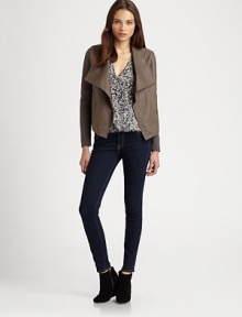 Butter-smooth leather styled with soft knit sleeves in a draped open-front style.Wide foldover collarKnit sleevesWelt pocketsAbout 22 from shoulder to hemBody: leatherSleeves: 64% acrylic/36% polyesterDry clean by a leather specialistImportedModel shown is 5'11 (180cm) wearing US size Small. Butter-smooth leather styled with soft knit sleeves in a draped open-front style.Wide foldover collarKnit sleevesWelt pocketsAbout 22 from shoulder to hemBody: leatherSleeves: 64% acrylic/36% polyesterDry clean by a leather specialistImportedModel shown is 5'11 (180cm) wearing US size Small.