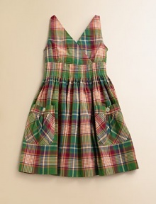 This fun sundress is crafted in preppy madras plaid with pintuck detailing and large patch pockets.V-neckSleeveless cross-front bodiceHidden side zipper with hook-and-eye closureWaist with pintuck detailingLarge patch pockets with button closureFull skirtCottonMachine washImported This fun sundress is crafted in preppy madras plaid with pintuck detailing and large patch pockets.V-neckSleeveless cross-front bodiceHidden side zipper with hook-and-eye closureWaist with pintuck detailingLarge patch pockets with button closureFull skirtCottonMachine washImported