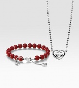 From the Love Britt Collection. A sleek set in sterling silver and warm wood with iconic GG accents, perfect for your valentine. Sterling silverVarnished wood beadsNecklace length, about 15Pendant size, about ¾Adjustable bracelet Lobster clasp bracelet closureLobster clasp necklace closureMade in Italy