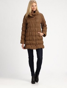 A puffy nylon jacket with a decidedly feminine silhouette and convenient slash pockets.Stand collarConcealed front closureSlash pocketsAbout 34 from shoulder to hemBody: nylonFill: down feathers/other feathersDry cleanImportedSIZE & FIT Model shown is 5'10½ (179cm) wearing a US size Small. A puffy nylon jacket with a decidedly feminine silhouette and convenient slash pockets.Stand collarConcealed front closureSlash pocketsAbout 34 from shoulder to hemBody: nylonFill: down feathers/other feathersDry cleanImportedSIZE & FIT Model shown is 5'10½ (179cm) wearing a US size Small.