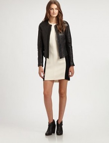 A seasonal favorite in supple Italian leather, updated with braided details and a modified shirttail hem. CrewneckFront zipCenter braided trimLong sleeves with zippered cuffsPanel constructionModified shirttail hemFully linedAbout 21 from shoulder to hemLamb leatherDry cleanImported of Italian fabricSIZE & FIT Model shown is 5'10 (178cm) wearing a US size 4. A seasonal favorite in supple Italian leather, updated with braided details and a modified shirttail hem. CrewneckFront zipCenter braided trimLong sleeves with zippered cuffsPanel constructionModified shirttail hemFully linedAbout 21 from shoulder to hemLamb leatherDry cleanImported of Italian fabricSIZE & FIT Model shown is 5'10 (178cm) wearing a US size 4.