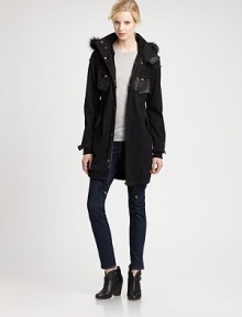 Versatile parka with a fox fur collar and inner removable rabbit fur vest for added warmth. Versatile parka with a fox fur collar and inner removable rabbit fur vest for added warmth.