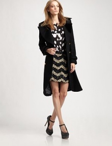 A shapely double-breasted topper finished with oversized lapels and polished buttons on rich blended wool.Notch collarDefined shouldersBuckled cuffsBodice dartsDouble-breasted button closureVented backAbout 39 from shoulder to hem80% wool/20% nylonDry cleanImported of Italian fabricModel shown is 5'9 (175cm) wearing US size Small. A shapely double-breasted topper finished with oversized lapels and polished buttons on rich blended wool.Notch collarDefined shouldersBuckled cuffsBodice dartsDouble-breasted button closureVented backAbout 39 from shoulder to hem80% wool/20% nylonDry cleanImported of Italian fabricModel shown is 5'9 (175cm) wearing US size Small.