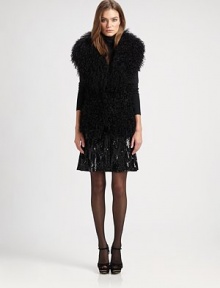 As luxurious as it is dramatic, this fabulous vest of fluffy curly lamb makes an edgy yet elegant layer.Wide shawl collarHook-and-bar front closeFront welt pocketsSilk liningAbout 28 from shoulder to hemLamb furDry clean by fur specialistImportedFur origin: AustraliaSIZE & FITModel shown is 5'10 (177cm) wearing US size Small. As luxurious as it is dramatic, this fabulous vest of fluffy curly lamb makes an edgy yet elegant layer.Wide shawl collarHook-and-bar front closeFront welt pocketsSilk liningAbout 28 from shoulder to hemLamb furDry clean by fur specialistImportedFur origin: AustraliaSIZE & FITModel shown is 5'10 (177cm) wearing US size Small.