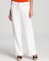 Appealing to your laid-back side, these linen Vince pants perfect beach-chic--easy over a bikini or layered at a bonfire. Add a pop of color and a straw carryall and you're set for sunny days ahead.