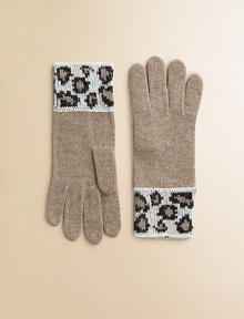 Wildly chic gloves in a wool blend, styled with leopard-print trim and a touch of cashmere for the fashionista in your life. Polyester/nylon/wool/angora/cashmereHand washImported Wildly chic gloves in a wool blend, styled with leopard-print trim and a touch of cashmere for the fashionista in your life. Polyester/nylon/wool/angora/cashmereHand washImported