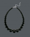 Perfect your look in standout style. Necklace by Avalonia Road features bold, black onyx beads (6-1/2-22 mm) that form a statement-making, graduated halo. Set in sterling silver. Approximate length: 16 inches.