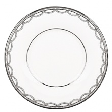Elegant and traditional, this fine china, featuring graceful platinum scalloping, calls to mind the perfectly iced wedding cake. Elegant and traditional, this fine china, featuring graceful platinum scalloping, calls to mind the perfectly iced wedding cake.