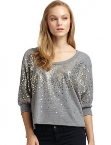 THE LOOKScoopneckTwo-tone sequins adorn the frontDolman sleevesBoxy silhouetteRibbed neckline and cuffsTHE FITAbout 21 from shoulder to hemTHE MATERIALPolyester/cotton/rayonCARE & ORIGINMachine washMade in USAModel shown is 5'8 (172½cm) wearing US size Small. 