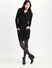 Rich, wool knit topper with a deep cowl collar to cinch closed with drawstrings.Convertible cowl collar Snap front Patch pockets Long sleeves Rib knit trim About 35½ from shoulder to hem Wool Dry clean Imported