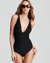 Designed to flatter and enhance your figure, this black one piece from Miraclesuit is anything but basic. Pile on the accessories and make it your own.