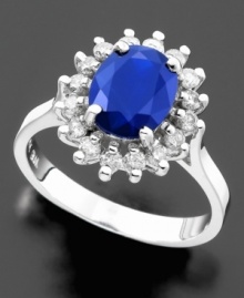 Sophisticated elegance. A ring inspired by royalty features a prong-set oval-cut sapphire (2 ct. t.w.) surrounded by sparkling round-cut diamonds (1/2 ct. t.w.). Set in 14k white gold. Sophisticated elegance. A ring inspired by royalty features a prong-set oval-cut sapphire (2 ct. t.w.) surrounded by sparkling round-cut diamonds (1/2 ct. t.w.). Set in 14k white gold.