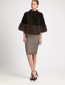 This cropped, reversible style features supple leather on one side and soft shearling on the other.Stand collarSnap closuresShort sleevesBanded shearling trimReversibleAbout 22 from shoulder to hemDyed sheepskinDry cleanImportedFur origin: Spain and ItalyModel shown is 5'11 (180cm) wearing US size 4.This style runs large. We recommend ordering one size down for a standard fit. This cropped, reversible style features supple leather on one side and soft shearling on the other.Stand collarSnap closuresShort sleevesBanded shearling trimReversibleAbout 22 from shoulder to hemDyed sheepskinDry cleanImportedFur origin: Spain and ItalyModel shown is 5'11 (180cm) wearing US size 4.This style runs large. We recommend ordering one size down for a standard fit.