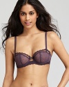 A sheer lace demi bra with vertical seam detail for uplifting results. An alluring style from Chantelle. Style #3645