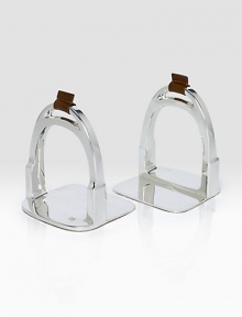 Equestrian-inspired silver-plated brass stirrups lend the perfect finishing touch to a cherished library.5 L x 6 W x 4½ HSilver-plated brass, leather and suedeImported Equestrian-inspired silver-plated brass stirrups lend the perfect finishing touch to a cherished library.5 L x 6 W x 4½ HSilver-plated brass, leather and suedeImported