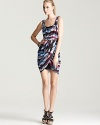 Exude tropical-chic in this GUESS dress, boasting gorgeous draping and a vibrant palm tree motif.