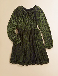 Long-sleeved, knit frock adorned with a bold leopard print and finished with pearl-like buttons and a full skirt.Round neckline with tieLong sleevesFront buttonsElastic waistbandFull skirtModalMachine washImported Please note: Number of buttons may vary depending on size ordered. Long-sleeved, knit frock adorned with a bold leopard print and finished with pearl-like buttons and a full skirt.Round neckline with tieLong sleevesFront buttonsElastic waistbandFull skirtModalMachine washImported Please note: Number of buttons may vary depending on size ordered.