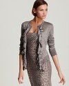 A lustrous metallic sheen and cascading ruffles update Rachel Roy's must-have cardigan with feminine flair.