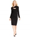 An asymmetrical neckline with cutout detail adds an alluring spin to this black dress by Maggy London.