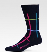 A bold, energetic grid pattern lends modern flair to this simple dress sock shaped in a soft cotton blend with a hint of stretch for maximum comfort and support.Mid-calf height80% cotton/18% polyester/2% elasticMachine washImported