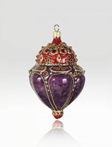 The Heritage of Jay Strongwater began as the bejeweled frame with beautiful stone settings and scrolls, becoming the source of inspiration for this season's new glass ornament collection. This ornament is mouth blown and decorated in Poland with a wonderful team of old world craftsmen. Detailed with crystals, hand applied jewel tone colors and scrolls as if it were a fine piece of jewelry.GlassCrystalMouth blownHand-painted and hand-set4.75H X 2.75W X 2.75DImported The Heritage of Jay Strongwater began as the bejeweled frame with beautiful stone settings and scrolls, becoming the source of inspiration for this season's new glass ornament collection. This ornament is mouth blown and decorated in Poland with a wonderful team of old world craftsmen. Detailed with crystals, hand applied jewel tone colors and scrolls as if it were a fine piece of jewelry.GlassCrystalMouth blownHand-painted and hand-set4.75H X 2.75W X 2.75DImported