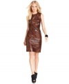 This knockout dress from Vince Camuto features leather-esque distressed look and a sleek, flattering fit.