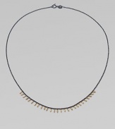 A delicate design with 14k gold beads on oxidized sterling silver chain. 14k gold beadsOxidized sterling silverLength, about 16Spring ring closureMade in USA 