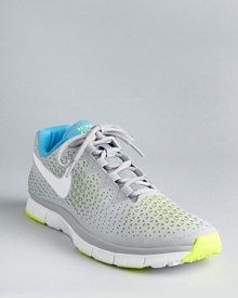 This dynamic minimal-training sneaker features a laser-cut perforation skin and a mesh inner lining for an aesthetically unique high-performance design you'll love to wear whether you're at the gym or kicking around the soccer ball with friends. This dynamic minimal-training sneaker features a laser-cut perforation skin and a mesh inner lining for an aesthetically unique high-performance design you'll love to wear whether you're at the gym or kicking around the soccer ball with friends.