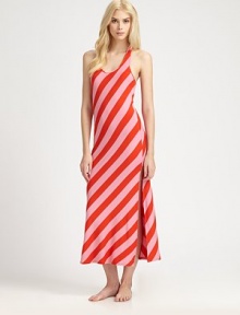 Flirtatious contrasting stripes hug every curve on this retro-inspired design with a sexy side slit. Scoopneck with built-in shelf braSleevelessSide slitRacerbackAbout 52 long96% rayon/4% spandexMachine washImported Flirtatious contrasting stripes hug every curve on this retro-inspired design with a sexy side slit. Scoopneck with built-in shelf braSleevelessSide slitRacerbackAbout 52 long96% rayon/4% spandexMachine washImported
