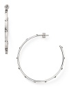 Strong but simple. This pair of silver-plated hoop earrings from MICHAEL Michael Kors are the perfect earrings for everyday - wear them as as shapely showpiece.