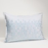 Inspired by the soothing reflections of water, Mirrors is transformed into a textural weave of tonal blues and aquas. The clean lines of the duvet harmonize with the geometric jacquard design. Tailored and modern, the silken touch and dimensional embroidery on decorative pillows add luxurious detail to this sophisticated collection.