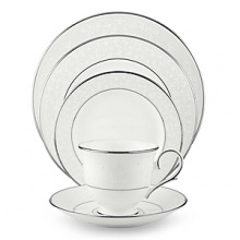 With enameled pearl-like dots, an opalescent background, and the innocence of bone china, Opal Innocence is a romantic pattern of understated elegance. Two bands of platinum a slightly wider one on the rim, kissing a thin fluted design, and a narrower one inside the border adorn each plate. The cup bears additional platinum on its graceful handle and another band at midpoint. Each piece is decorated with a flowing, white-on-white vine design peppered with enamel dots. This service creates a splendid formal table setting and, because of its neutral coloring, works well with any table décor. With enameled pearl-like dots, an opalescent background, and the innocence of bone china, Opal Innocence is a romantic pattern of understated elegance. Two bands of platinum a slightly wider one on the rim, kissing a thin fluted design, and a narrower one inside the border adorn each plate. The cup bears additional platinum on its graceful handle and another band at midpoint. Each piece is decorated with a flowing, white-on-white vine design peppered with enamel dots. This service creates a splendid formal table setting and, because of its neutral coloring, works well with any table décor.