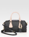 Bi-color Saffiano leather in a structured east-west silhouette with dual straps and goldtone hardware.Double top handles, 5 drop Adjustable shoulder strap, 19½-24½ drop Top zip closure Protective metal feet One inside zip pocket One inside open pocket Jacquard lining 11¾W X 6½H X 2D Made in Italy