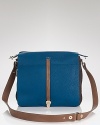 Work a bold shoulder with Furla's color block crossbody, flaunting a covet-worthy hue. The leather bag makes an luxe statement worn with cashmere and classic riding boots.