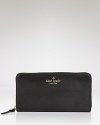 This simple wallet takes kate spade new york's day-right style to sophisticated terrain. Not only does it boast ample pockets, but there's luxe leather for added allure.