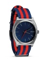 Nixon shows it's stripes with this nautical-inspired watch. A perfect fusion of performance and summer-right style, it flaunts a flexible a nylon bracelet, 100 meter water resistance, and custom colored oxide face.