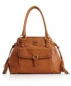 Two-toned tassels, exposed chunky stitching and a convenient flap pocket lend the classically chic Florentine satchel a fresh vibe.