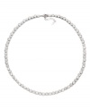 Pave perfection. Glittering pave crystals and cubic zirconias (9-1/2 ct. t.w.) adorn this chic collar necklace from Eliot Danori. Simple yet stunning by design, it's set in silver tone mixed metal. Approximate length: 16 inches + 2-inch extender.