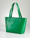 Lauren Ralph Lauren gives its tried-and-true tote an elegant update with studded details and an embossed logo.