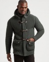 A striking combination of tradition and modernity, this classic duffel coat silhouette is knitted in a superior wool blend with a removable hood, faux-fur lining for long-lasting warmth and comfort.Button-frontRemovable hoodStand collarWaist flap pocketsAbout 35 from shoulder to hemFully lined80% wool/20% nylonHand washMade in Italy