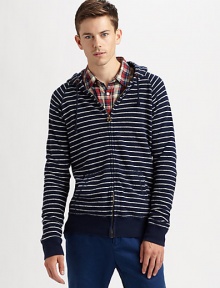 Nautical inspirations overtake a traditional zip-up hoodie, offering a sporty, yet sophisticated finish.Zip frontAttached drawstring hoodKangaroo pocketsBanded cuffs and hemCottonDry cleanImported Nautical inspirations overtake a traditional zip-up hoodie, offering a sporty, yet sophisticated finish.Zip frontAttached drawstring hoodKangaroo pocketsBanded cuffs and hemCottonDry cleanImported