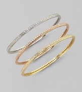 A slim-lined bracelet in 18k rose gold, set all around with a ring of sparkling diamonds. Diamonds, 2.07 tcw 18k rose gold Diameter, about 2¾ Made in Italy