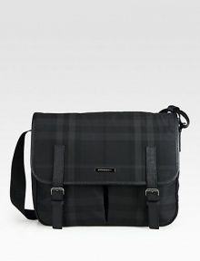 Leather trimmed nylon crossbody in iconic check print design.Flap, buckle closureAdjustable shoulder strapExterior, interior pockets95% nylon/5% acrylic15W X 12H X 3¼DMade in Italy Leather trimmed nylon crossbody in iconic check print design.Flap, buckle closureAdjustable shoulder strapExterior, interior pockets95% nylon/5% acrylic15W X 12H X 3¼DMade in Italy